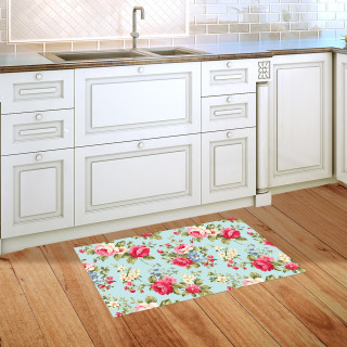 Spring Floral Doormat with pink flowers and green leaves on light blue background in kitchen.