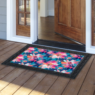 Vibrant floral doormat with pink, orange, and blue flowers on a black background with decorative border.
