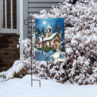 Snowy church scene on Holy Night Garden Flag with snow-covered trees and house in background.