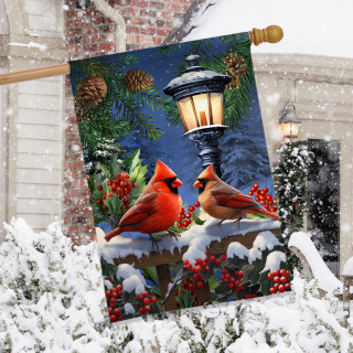 Winter Glow Cardinals House Flag with two cardinals, snow, lantern, and red berries on a house.