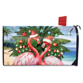 Festive Flamingos Mailbox Cover with pink flamingos, Christmas ornaments, and palm trees on a beach.