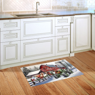 Snowy Christmas on the Farm Doormat on wooden kitchen floor beside white cabinets and sink.