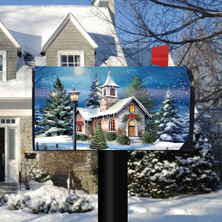 Holy Night Oversized Mailbox Cover with snowy church scene and trees on a black mailbox post.