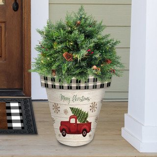 Merry Christmas Pickup Truck large planter with evergreen tree and red truck design on front porch.