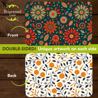 Dining in Style Placemat 4-pack, double-sided floral designs, vibrant orange, blue, and brown colors shown.