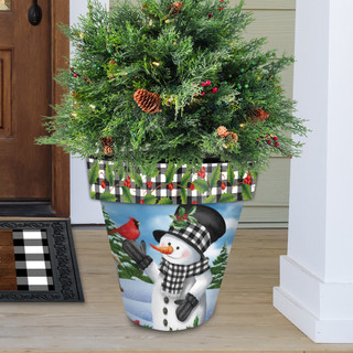 Large Checkered Snowman Planter with evergreen tree and red berries on a front porch step.