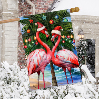 Festive Flamingos House Flag with pink flamingos, Christmas tree, and beach scene in vibrant colors.