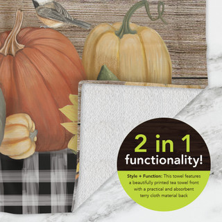 Bountiful Bushel Cotton Hand Towel, orange pumpkin design, white cotton towel, folded corner visible.