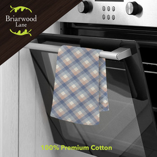 Pink and blue check cotton hand towel hanging on oven handle, Briarwood Lane brand, premium cotton.