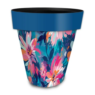 Large Abstract Floral Planter with blue rim, colorful pink, orange, and white flowers, teal background.