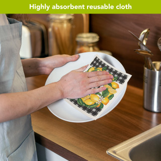 Lemon Wreath Swedish Dishcloth drying plate with black and white checkered reusable cloth.