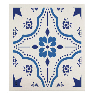 Blue and white ornamental Swedish dishcloth with floral design and geometric patterns on cream background.