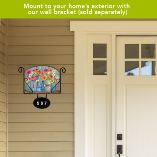 Farm Fresh Flowers Acrylic Art Sign mounted on house wall beside white door with house number.