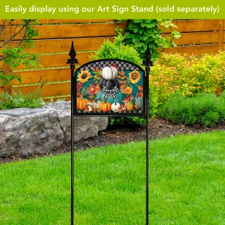 Colorful Pumpkin Stack Acrylic Art Sign with skeleton and flowers on a black garden display stand.