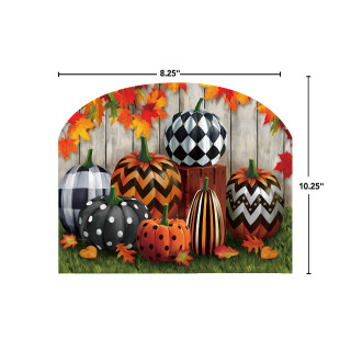 Patterned pumpkins acrylic art sign with orange, black, and white designs on a grassy background.
