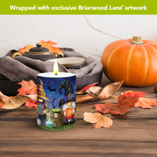 Halloween Gnomes flameless candle with exclusive Briarwood Lane artwork on a decorative Halloween themed setting.