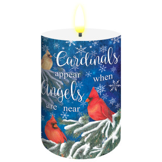 Cardinals Appear Flameless Candle with red cardinals and snowflakes on a blue background lit up.