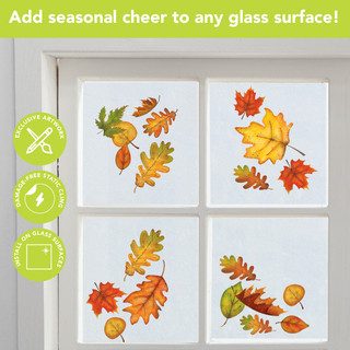 Colorful autumn leaves on four window clings, orange, yellow and green hues on white background.