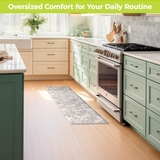 Distressed Tiles Oversized Comfort Mat in kitchen, gray and white design on wood floor beside oven.