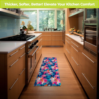 Abstract Floral Oversized Comfort Mat in vibrant pink, blue, and white hues on kitchen floor.