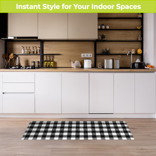 Black and white check oversized comfort mat on a kitchen floor, adding modern style indoors.