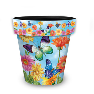 Fluttering Butterflies Medium Planter with colorful butterflies and flowers on a blue background.