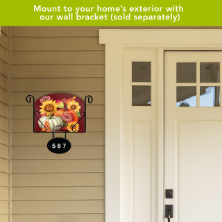 Fall Beauty Acrylic Art Sign with sunflowers and pumpkins, mounted on a house exterior wall bracket.