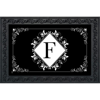 Black and white monogram doormat with floral design and letter F, decorative border.
