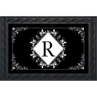 Black and white monogram doormat with floral design and letter R on a decorative background.