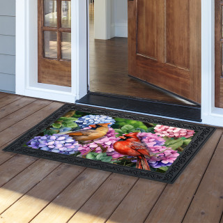 Perched Cardinals Doormat with colorful flowers and birds on a black background with decorative border.