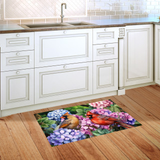 Perched Cardinals Doormat with colorful hydrangeas and vibrant cardinals on a kitchen floor beside cabinets.
