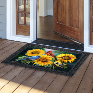 Birds in the Garden Doormat with vibrant sunflowers and birds on a black background.