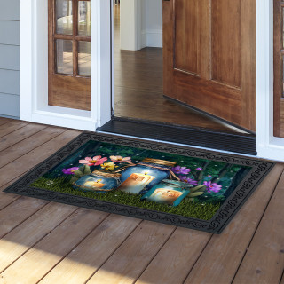Be a Light Jars colorful doormat with floral design on wooden porch outside open doorway entrance.