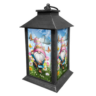 Springtime Gnome Lantern, black metal, colorful garden gnome design, pink hat, flowers, butterflies, blue sky.