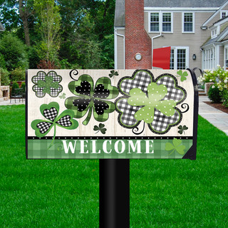 Patterned Shamrocks Oversized Mailbox Cover with green shamrocks and welcome text on a black post outdoors.