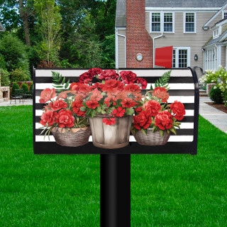 Striped mailbox cover with three potted red geraniums on a black and white background.