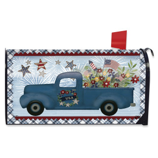 Blue Celebrate America Pickup mailbox cover with flowers, flag, and fireworks on a plaid background.