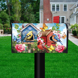 Floral Birdhouses Oversized Mailbox Cover with colorful birds, butterflies, and flowers on a lawn.