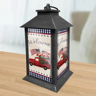 Stars and Stripes Truck Lantern, red truck, American flag design, black metal, patriotic decorative lantern.