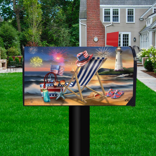 Oceanside Fireworks Mailbox Cover with patriotic beach scene and American flag design on green lawn.