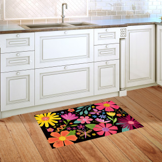 Spring Fling Doormat with colorful floral design on black background in a kitchen setting.
