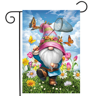 Springtime Gnome Garden Flag with colorful garden gnome and butterflies among flowers outdoors.