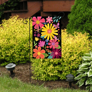 Vibrant Spring Fling Garden Flag with colorful flowers on black background, hanging on a garden stand.