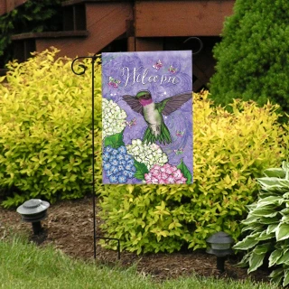 Hummingbird and Hydrangea garden flag with purple background, colorful flowers, and green hummingbird, Welcome text.