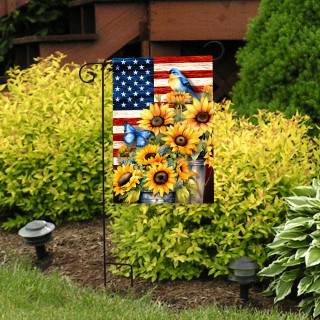 American Country Garden Flag with sunflowers, blue bird, and USA flag design on a garden stand.