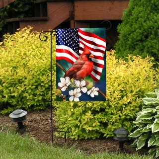 American Floral Cardinal Garden Flag with USA flag, red cardinal, and white flowers on display.