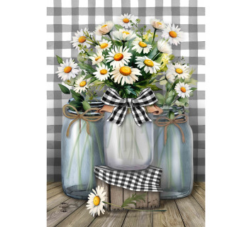 Three mason jars with white daisies and black and white checkered bows on a wooden surface.