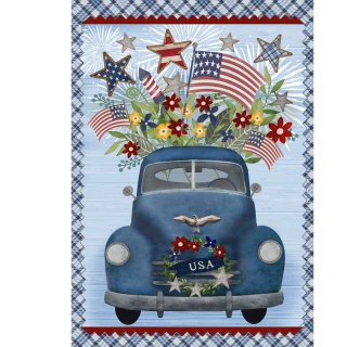 Blue vintage pickup truck with USA wreath, stars, flowers, and American flags on Celebrate America house flag.