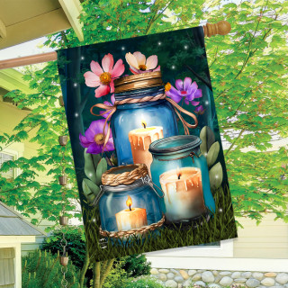 Be a Light Jars House Flag with lit candles and flowers on a garden flag outdoors.