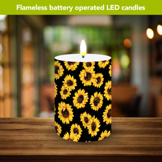 Sunflowers Flameless Candle, battery operated LED candle with yellow sunflower design on black background.
